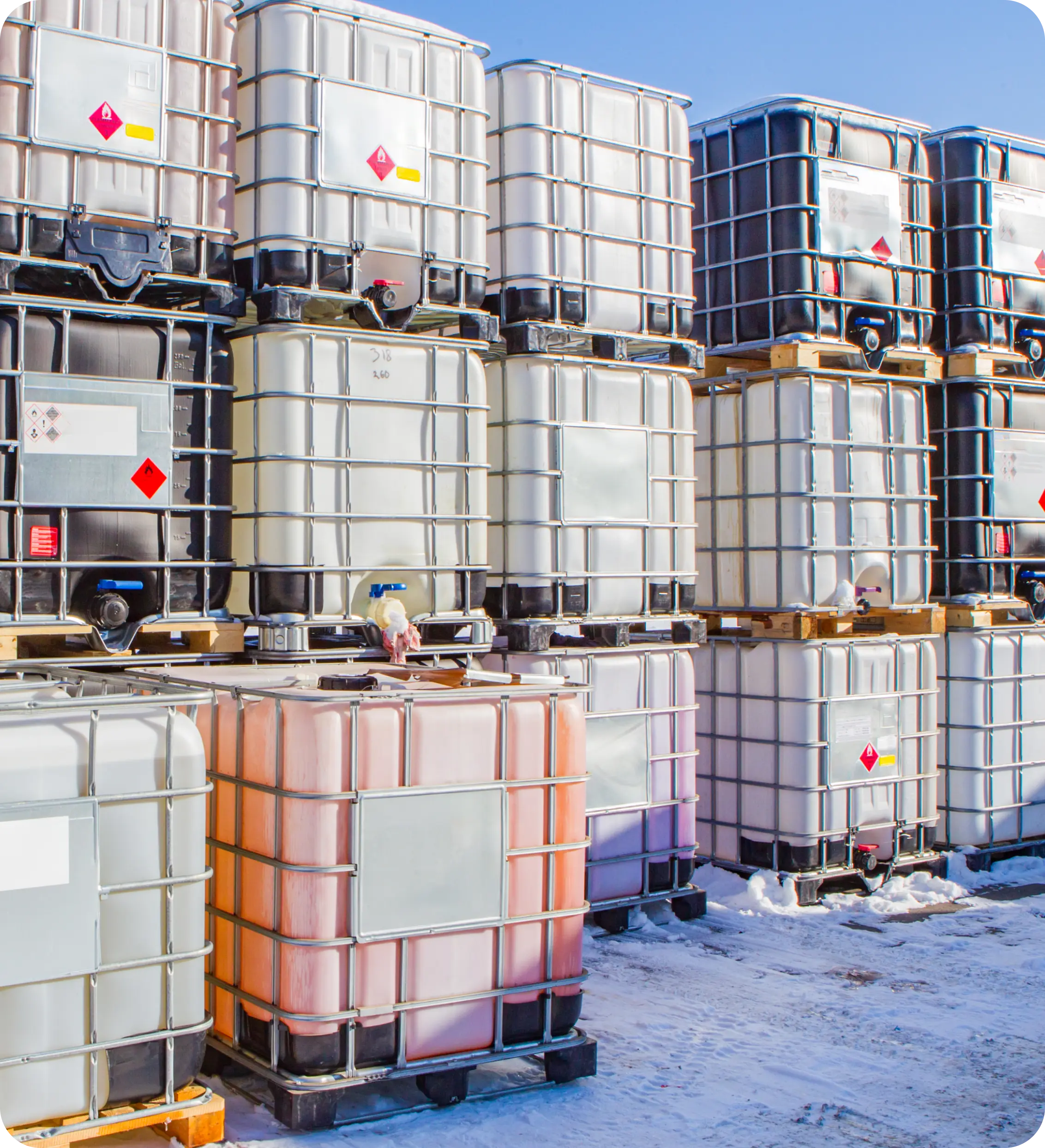 A large group of barrels stacked on top of each other.
