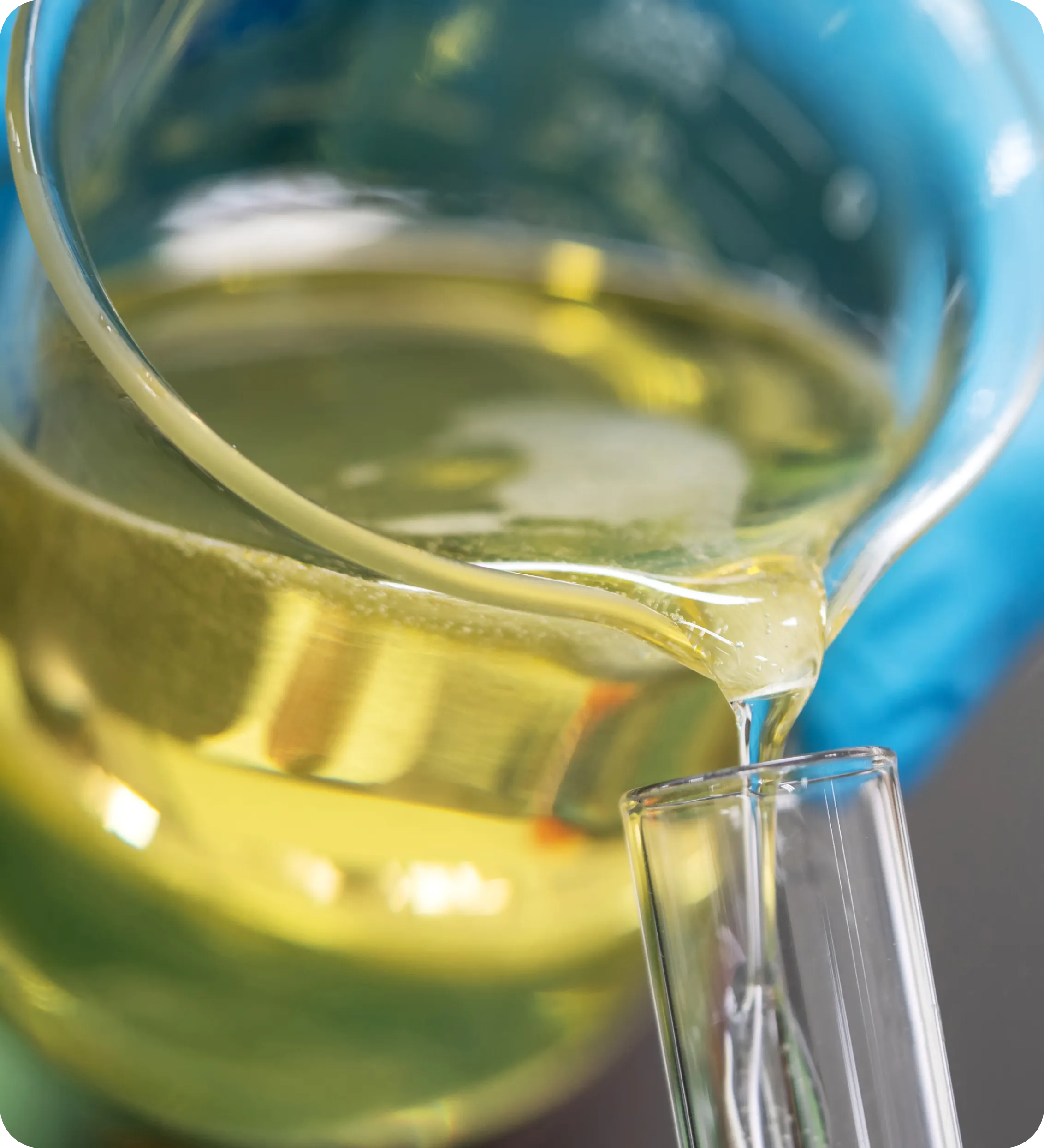 A close up of a glass with liquid inside